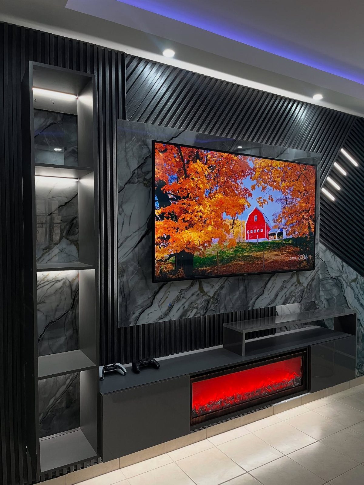 DIY LED Light Lamp Ideas: 27 Backlights, Pendants, Table Lamps 2 Entertainment center with a TV and vertical shelves featuring integrated white LED lighting.