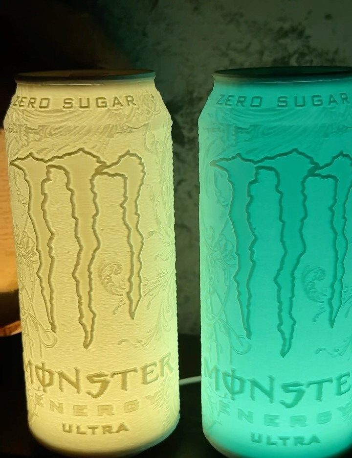 DIY LED Light Lamp Ideas: 27 Backlights, Pendants, Table Lamps 23 Two Monster Energy cans glowing with yellow and cyan internal LED lighting.