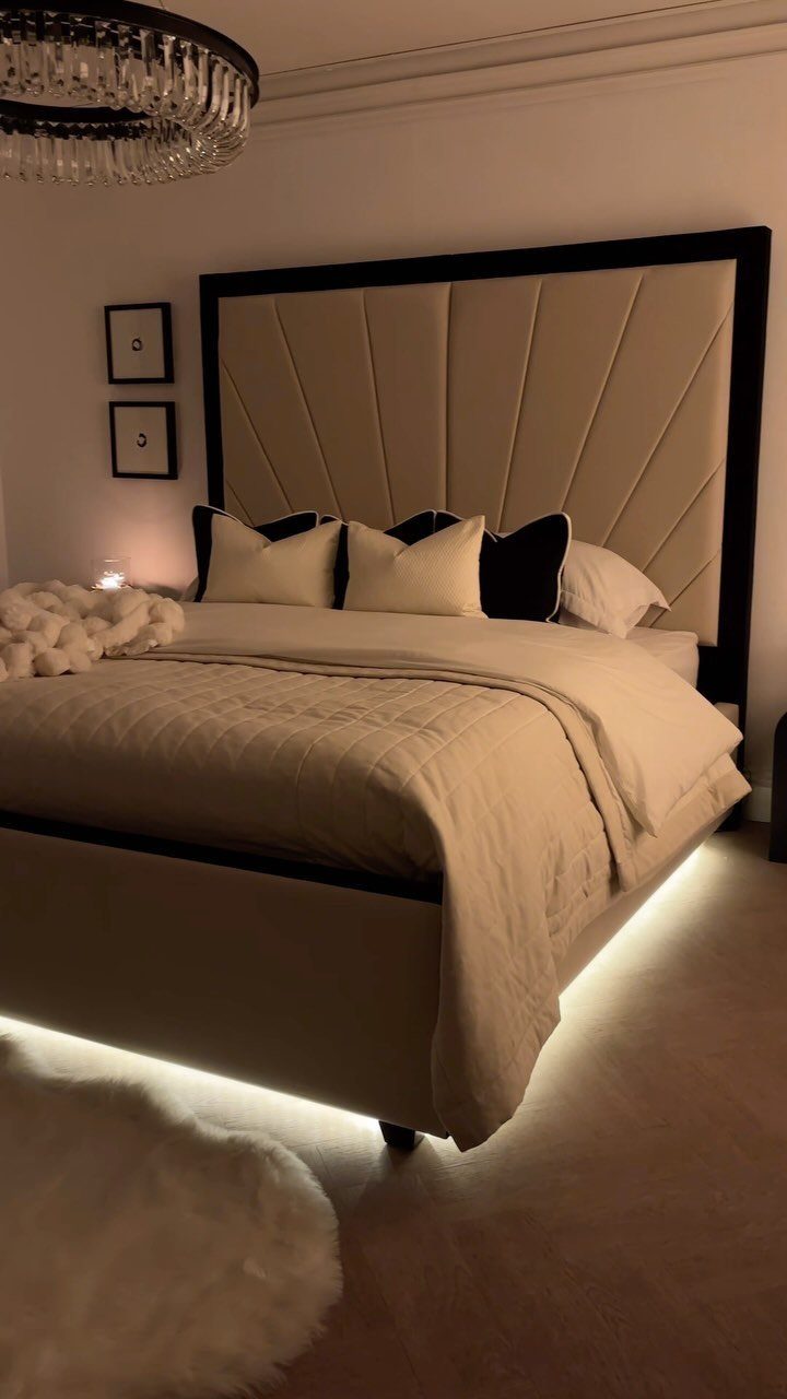 DIY LED Light Lamp Ideas: 27 Backlights, Pendants, Table Lamps 3 Beige bed with a fluted headboard and warm LED strip lighting underneath the frame.