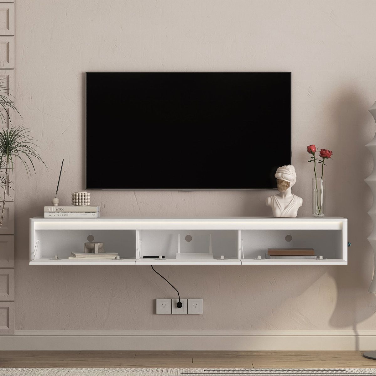 Floating Shelf Under TV Ideas: 31 Styles for Living Rooms 10 White floating TV console with a center cable hole under a black television.