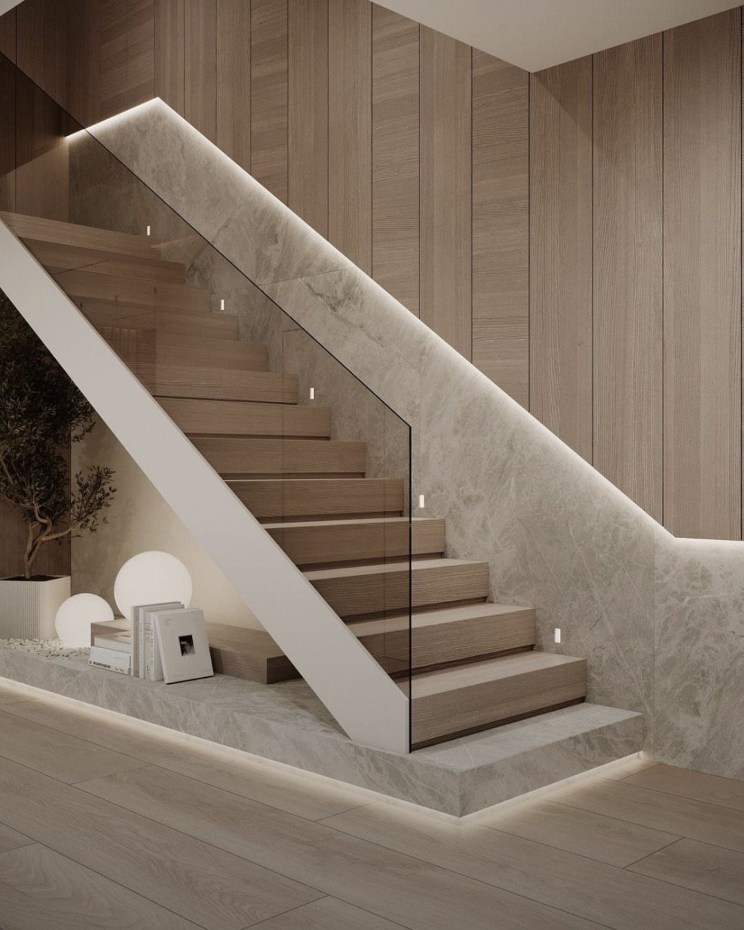 Modern staircase with integrated LED cove lighting along the handrail and base.