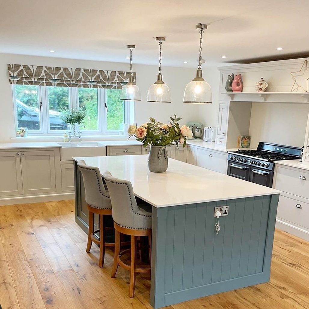 13 Kitchen Island Back Panel Ideas, From Beadboard to Stone 12 Blue kitchen island with vertical tongue-and-groove wood paneling and white countertop