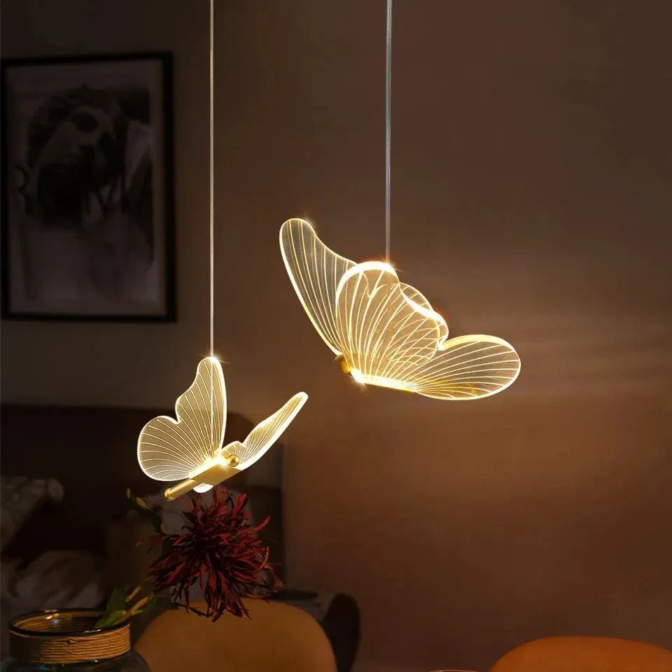 Lights for Room Decoration: 12 Ideas for Every Style in 2026 12 Glowing butterfly-shaped decorative lights hanging in a dimly lit room