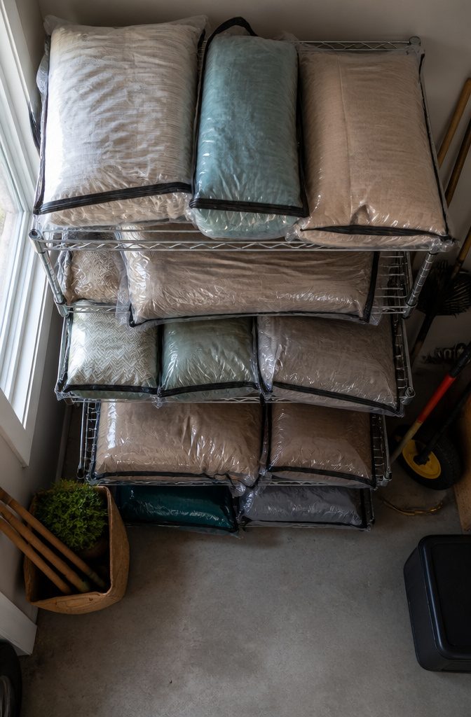 Large waterproof storage bags used for patio cushions.