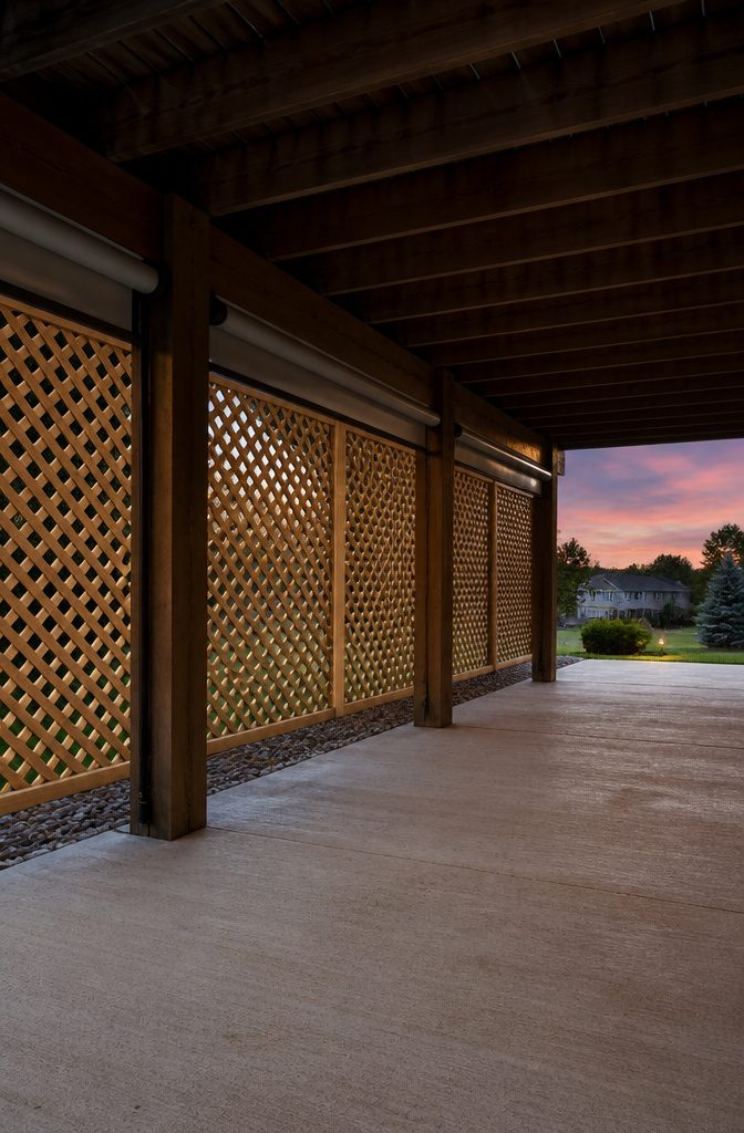 A ventilated under-deck area with lattice skirting for airflow.
